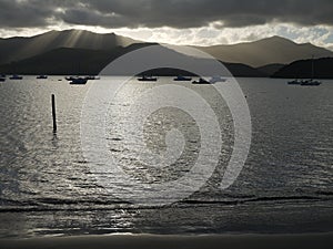 New Zealand: Akaroa harbour with distant sunlit clouds