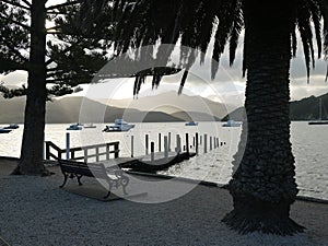 New Zealand: Akaroa harbour with flooded pier