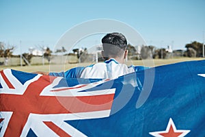 New Zealand flag, back and sports man with mockup space on blue sky outdoor. Aotearoa banner, national and athlete with