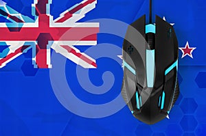 New Zealand flag and computer mouse. Concept of country representing e-sports team