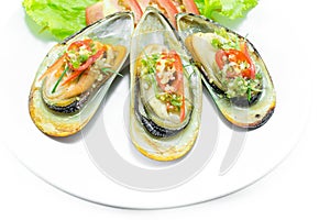 New Zealand green mussels on white plate