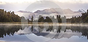 New Zealand lake view refection with morning sunrise sky