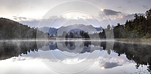 New Zealand lake view refection with morning sunrise sky