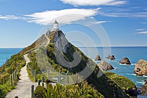 New zealand, lighthouse at nugget point photo