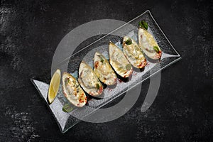 New Zealand mussels baked with cheese and spices