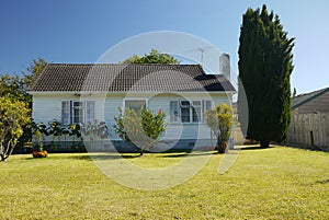 New Zealand: ordinary small house with lawn