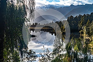 New Zealand\'s Southern Alps reflected in Lake Matheson