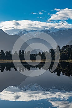 New Zealand\'s Southern Alps reflected in picturesque Lake Matheson