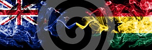 New Zealand vs Ghana, Ghanaian smoky mystic flags placed side by side. Thick colored silky abstract smoke flags