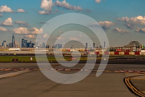 Newark Liberty Airport, Newark, New Jersey, USA - The New York City skyline on the horizon behind the runway
