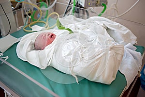 Newborn baby been examined immediately after childbirth