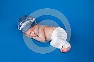 Newborn Baby Boy with Blue Cap