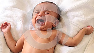 Newborn baby boy crying