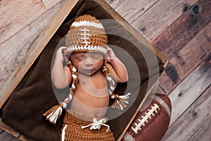 Newborn Baby Boy in Football Costume