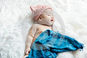 Newborn baby boy smiling feelgood happy photo