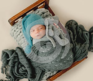 Newborn baby boy studio portrait