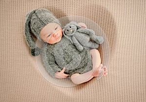 Newborn baby boy studio portrait