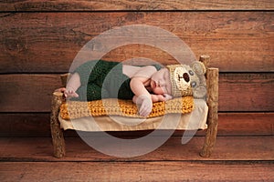 Newborn Baby Boy in a Teddy Bear Costume
