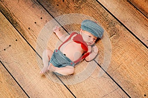 Newborn Baby Boy Wearing a Little Man Costume