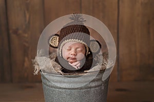 Newborn Baby Boy Wearing a Monkey Hat