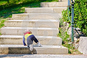 Newborn baby climb stairs step by step