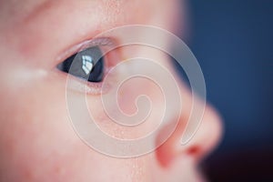 Newborn baby eye closeup