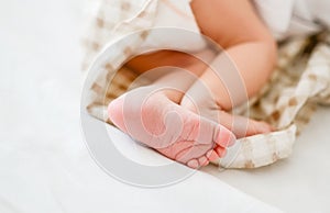 Newborn baby feet and fingers