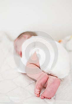 Newborn baby feet and fingers