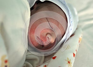 A newborn baby girl has just been born.