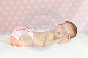 Newborn baby girl sleeping