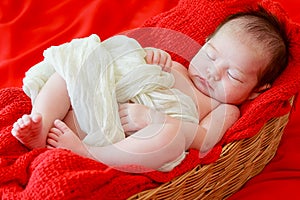 Newborn baby girl smiling in a dream ,Newborn baby girl is sleep