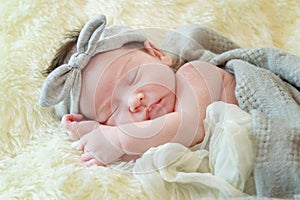 Newborn baby girl smiling in a dream ,Newborn baby girl is sleep