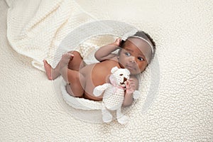 Newborn Baby Girl with Stuffed Bear