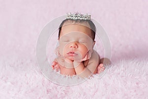 Newborn Baby Girl Wearing a Dainty Rhinestone Crown