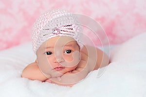 Newborn Baby Girl Wearing a Pink Flapper Style Hat