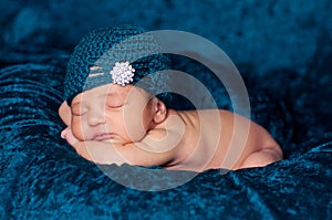 Newborn Baby Girl Wearing a Teal Flapper Style Hat