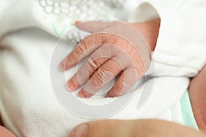 Newborn baby hand and fingers