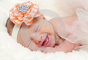 Newborn baby laughing photo