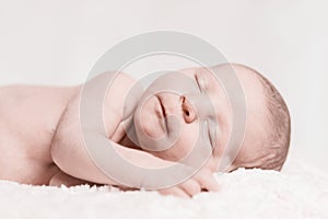 Newborn Baby Male Sleeping Closeup Face Smiling