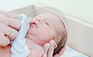 Newborn baby in maternity hospital