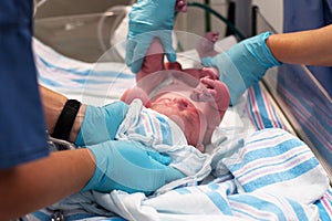 Newborn baby moments after birth