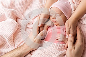 Newborn Baby Portrait in Family Hands, Sleeping New Born Kid, Parents Care