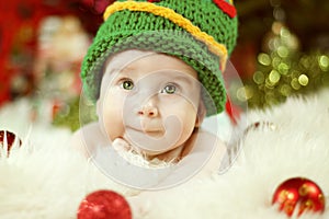 Newborn Baby Portrait, Happy New born Kid Boy in Green Hat