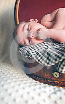 Newborn baby resting lying above of travel