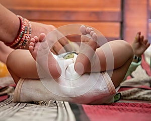 newborn baby`s little feet.close up of legs.