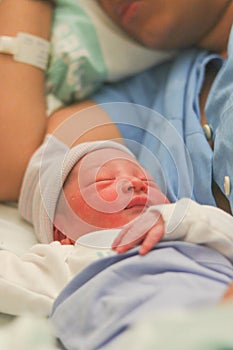 Newborn baby sleeping in the hospital