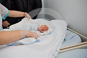 Newborn baby sleeping nursing discharge maternity clinic