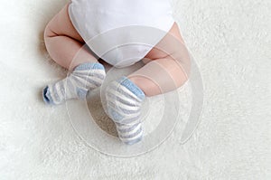 Newborn baby sleeping on white