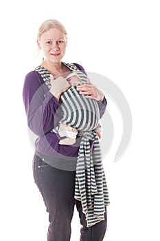 Newborn baby in sling