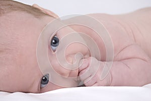 Newborn baby sucking finger